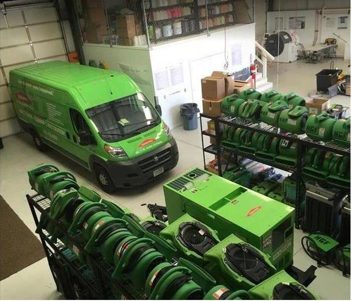 SERVPRO equipment and vehicle inside warehouse