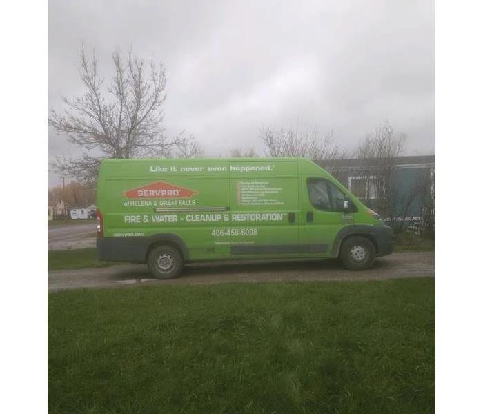 a SERVPRO parked in a driveway